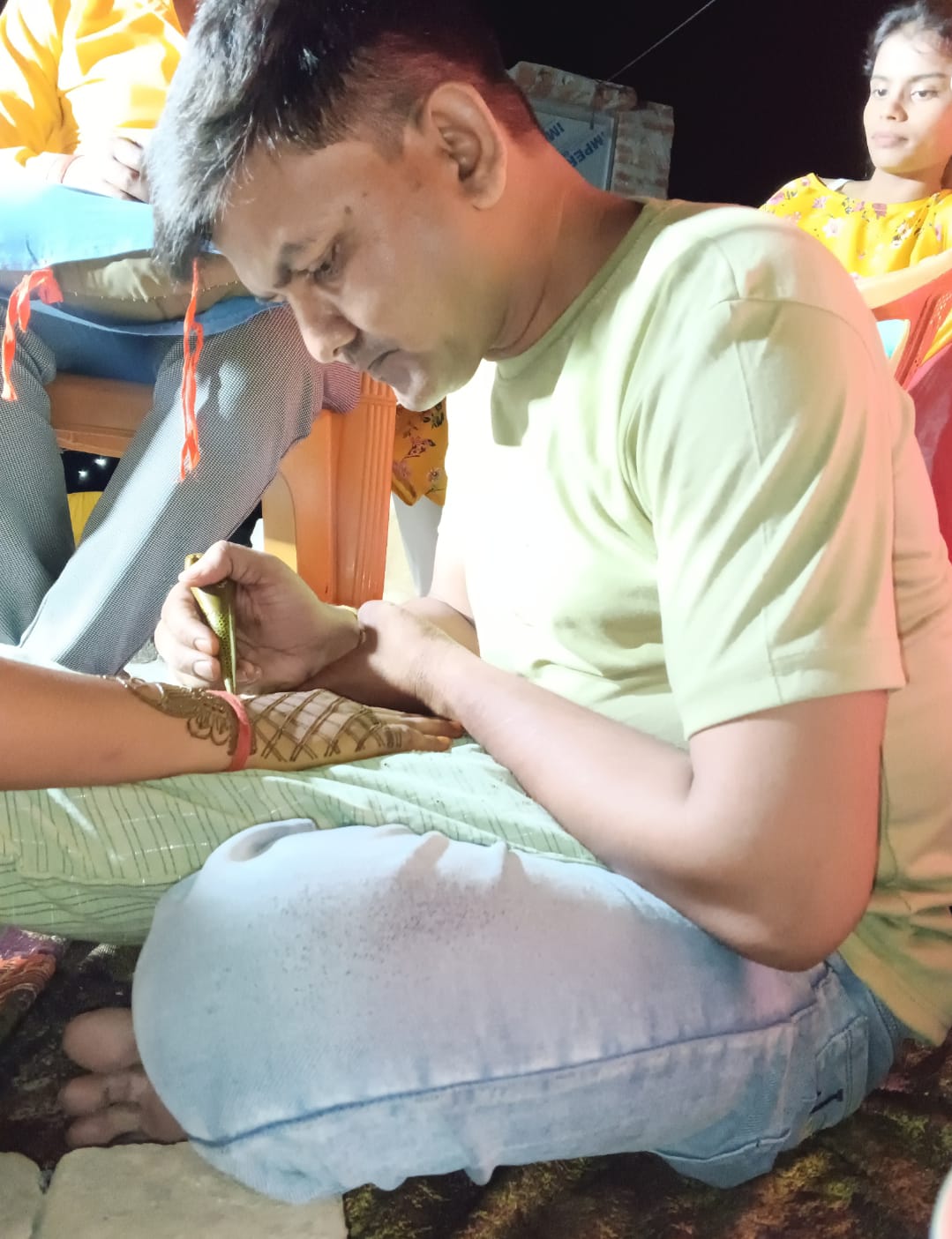 Zara working on mehndi design